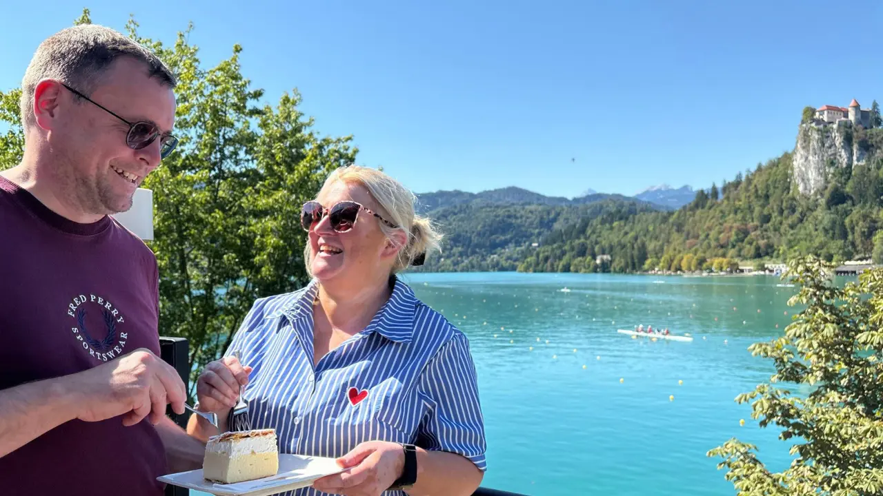 NMH customers with Bled cream cake, Lake Bled