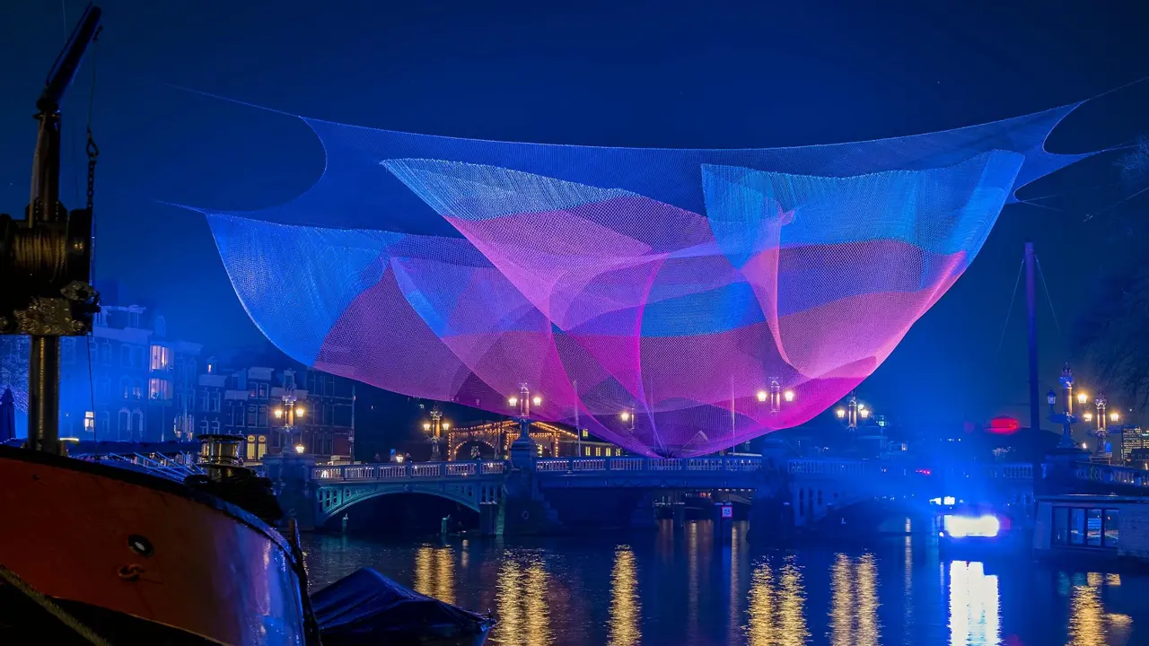 View of Amsterdam during the Light festival in the Netherlands at night