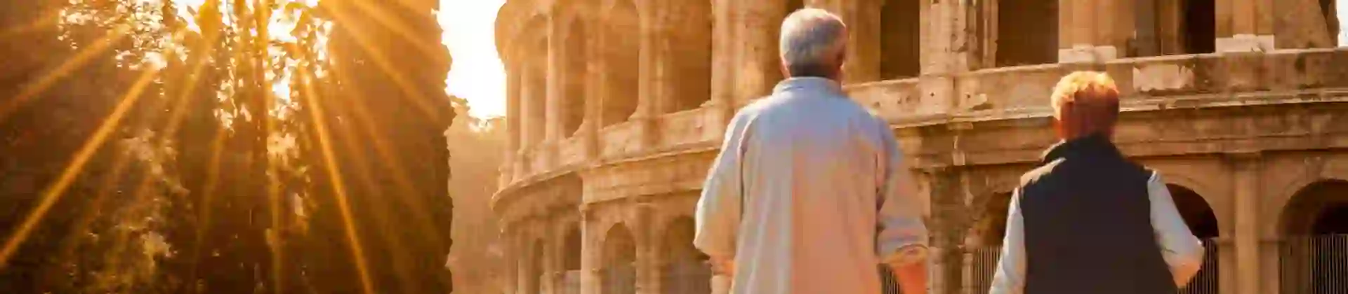 Senior Couple walking towards the Colosseum in Rome