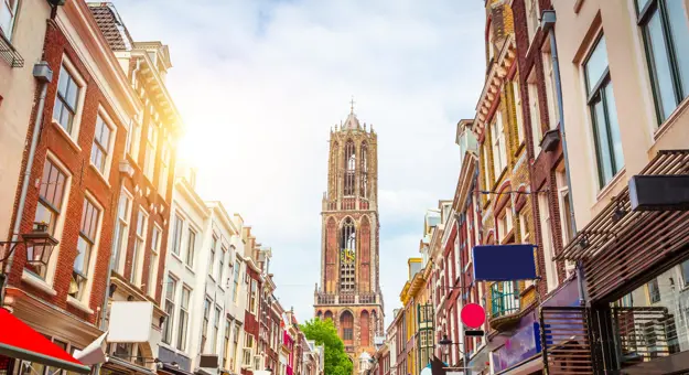 Traditional old buildings and tower of the Dom cathedral in Utrecht