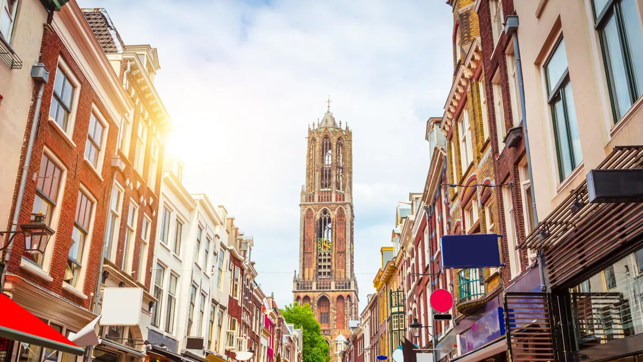 Traditional old buildings and tower of the Dom cathedral in Utrecht