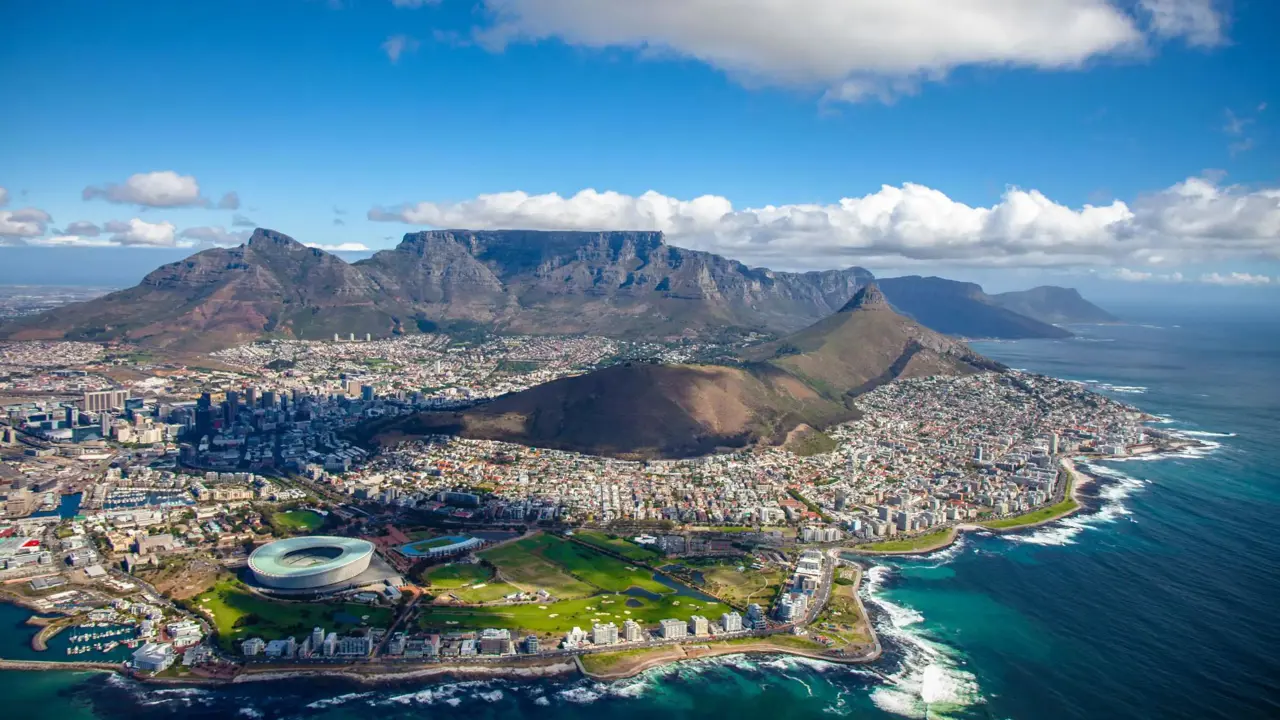 Aerial view of Cape Town with Table Mountain and the coastline in the background