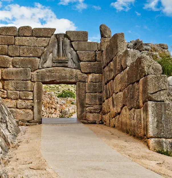 Ancient wall with an arch, with pathway going through it