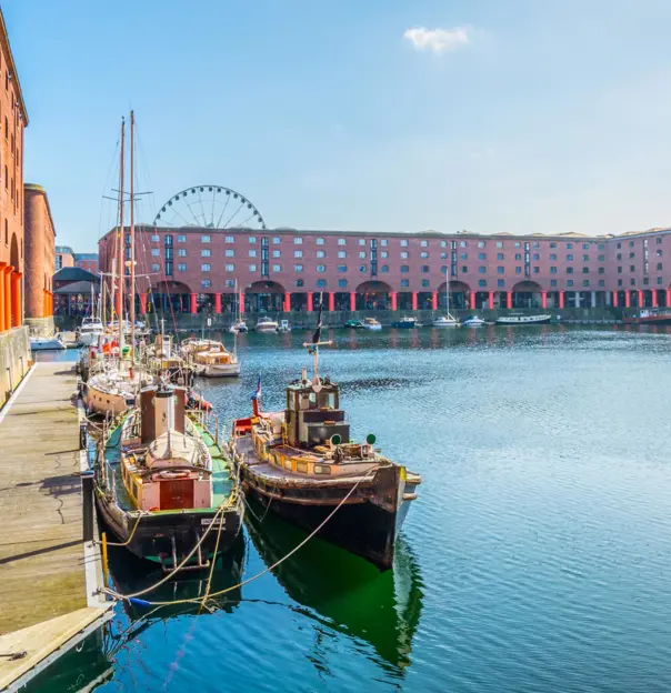 The Royal Albert Dock, Liverpool with boats in the harbour on a sunny day 