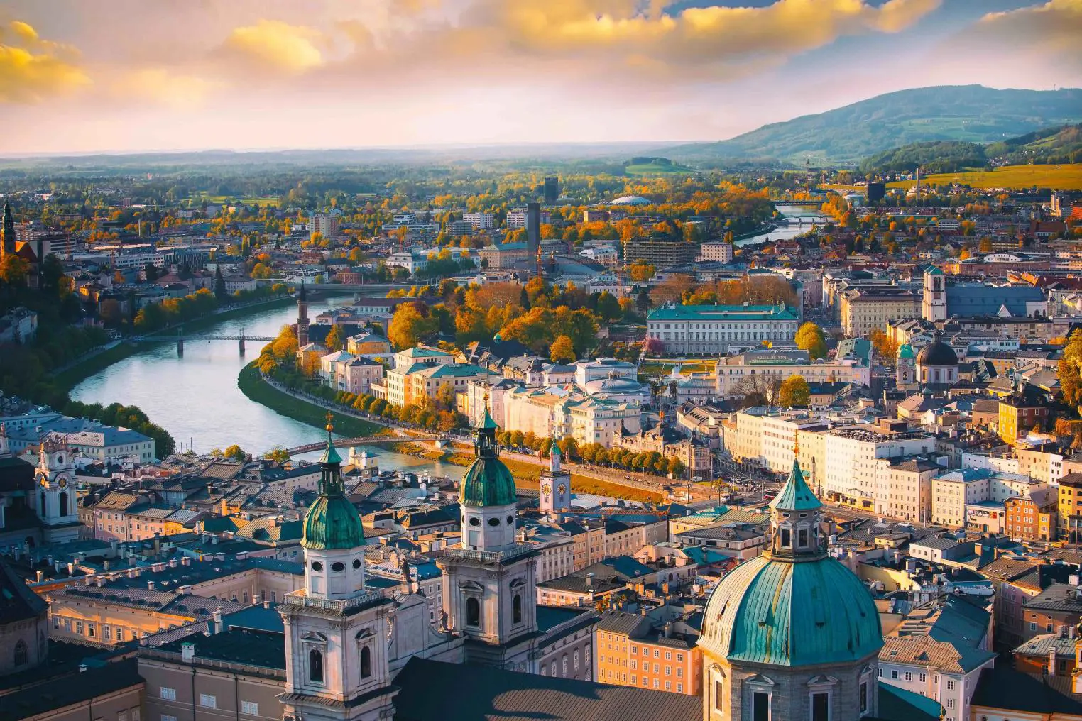 Panoramic view of the historic city of Salzburg and the Salzach Rriver in the evening light