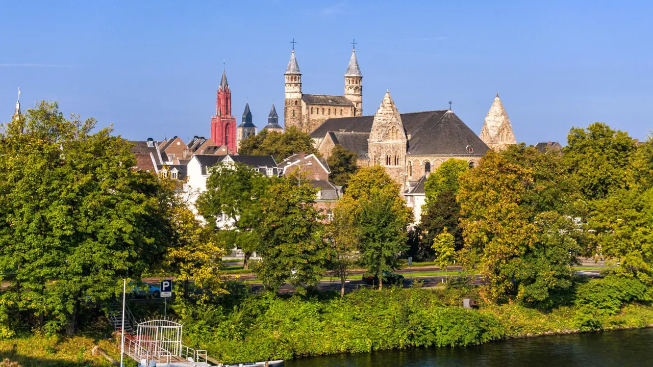 The three medieval churches of Maastricht, the Netherlands, seen from the bridge over the river Meuse