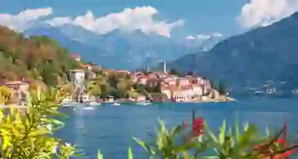 View of houses on the waterfront in Malcesine, Lake Garda with mountains in the distance