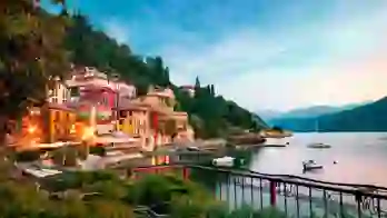 Buildings of Lake Como and the body of water at sunset