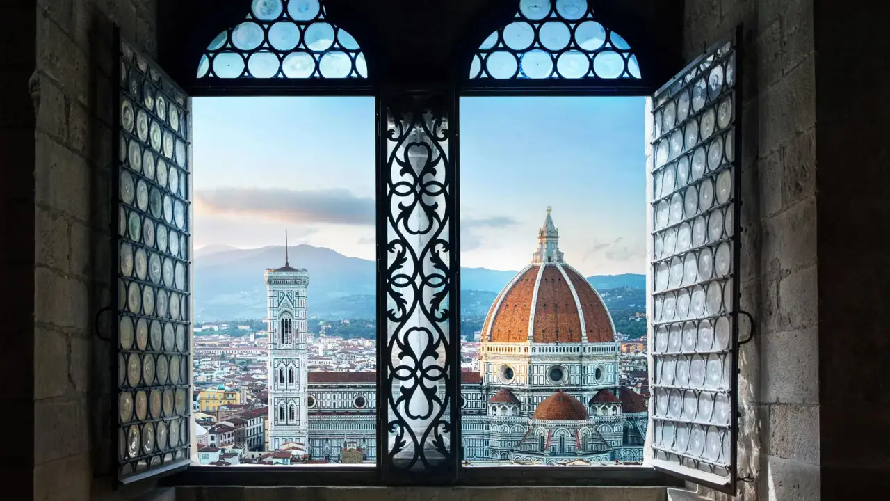 Florence cityscape through a window, showing the Cathedral of Santa Maria del Fiore