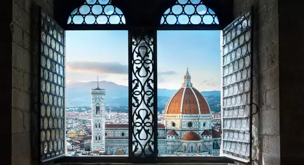 Florence cityscape through a window, showing the Cathedral of Santa Maria del Fiore