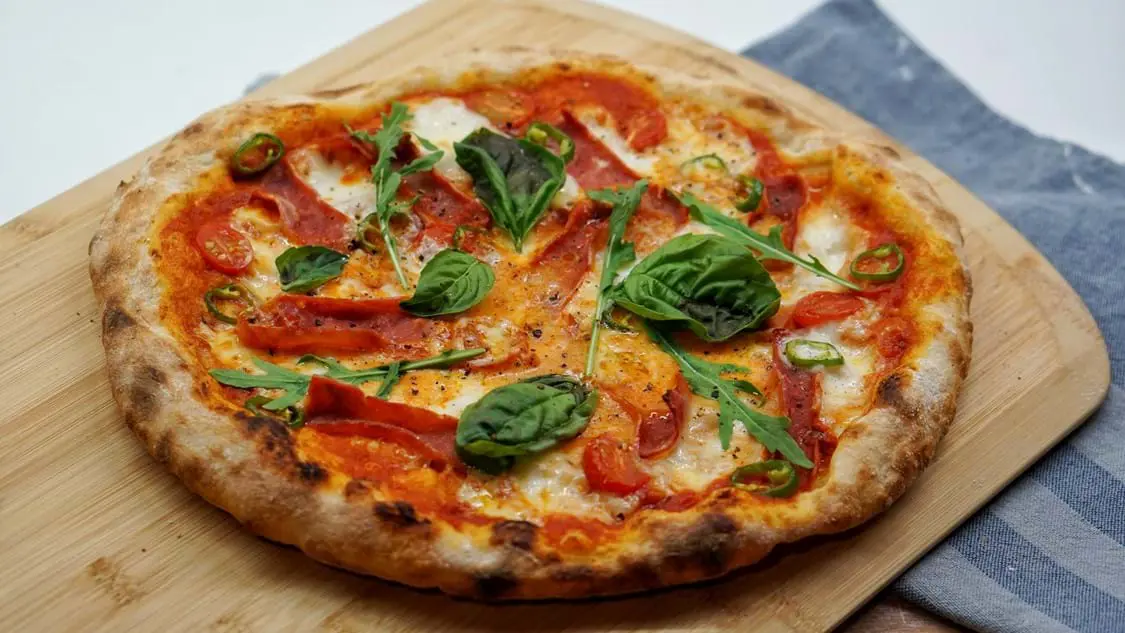 Margherita Pizza On Table In Naples