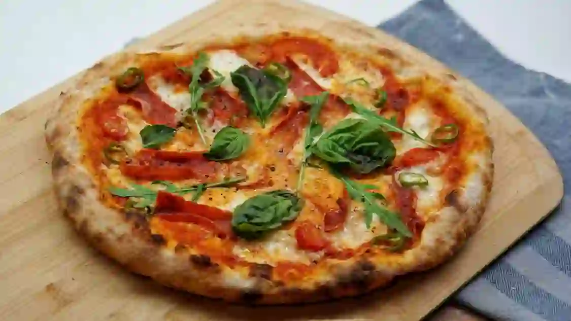Margherita Pizza On Table In Naples