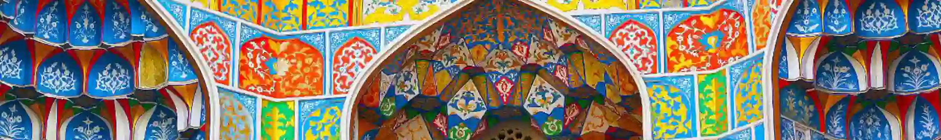 Kalyan Mosque with colourful tilework and patterned arches in Bukhara, Uzbekistan