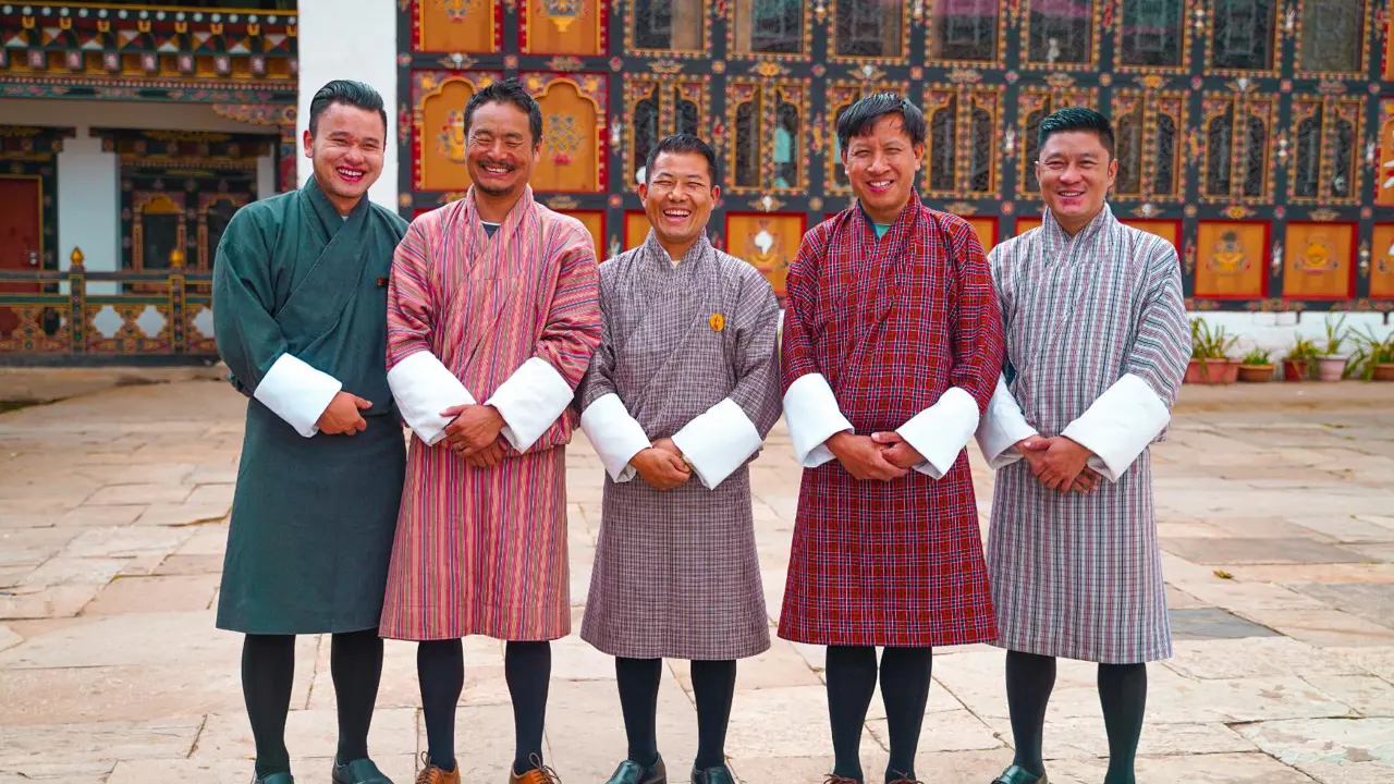 Men in Bhutanese national dress, gho