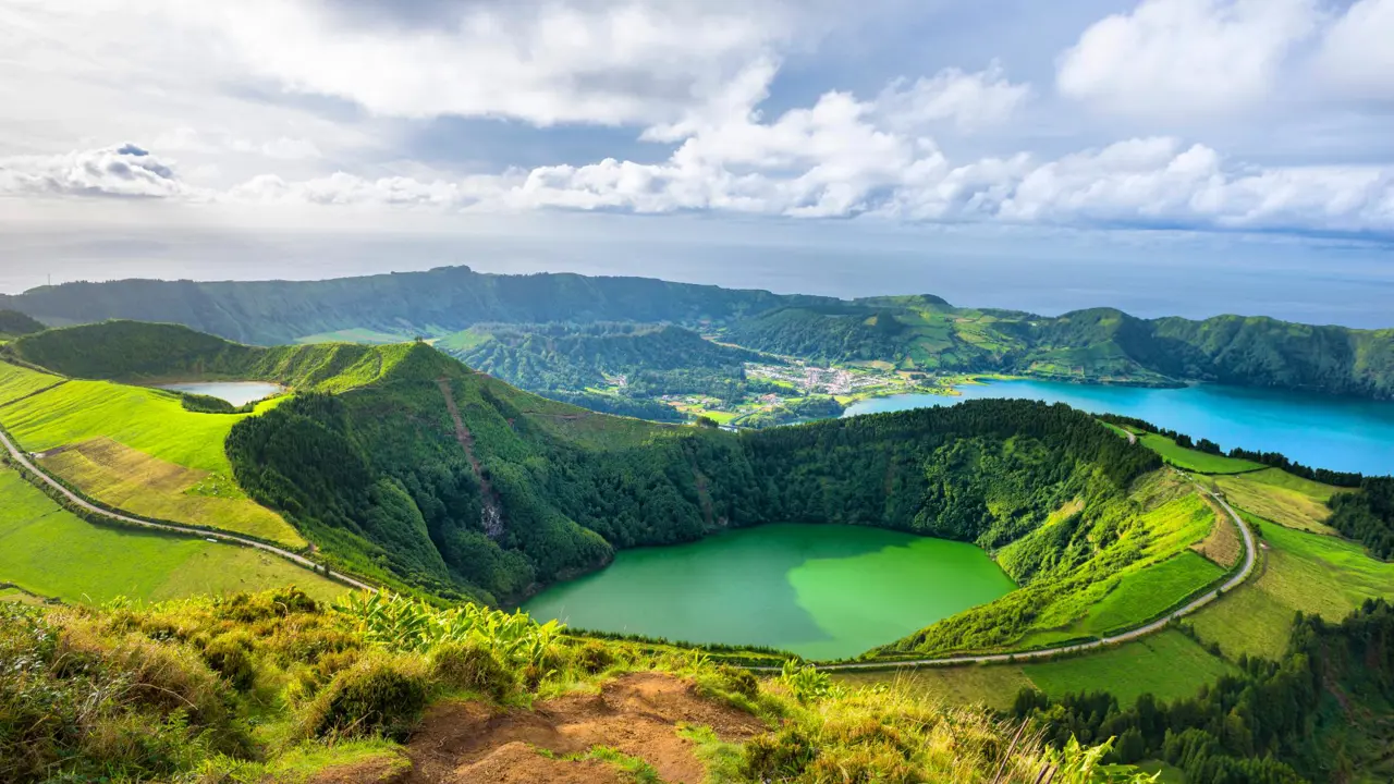 Mountain landscape with hiking trail and view of Ponta Delgada in the Azores, Portugal