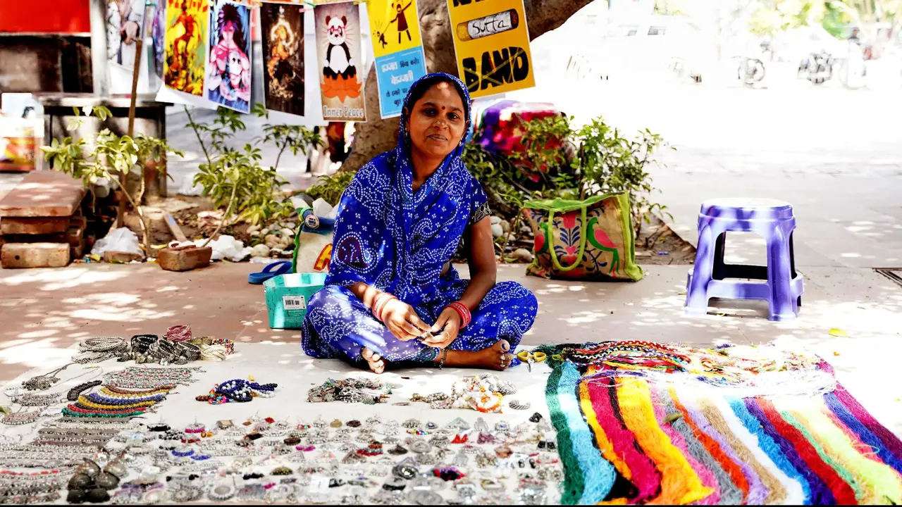 Street vendor selling jewellery, Delhi, India