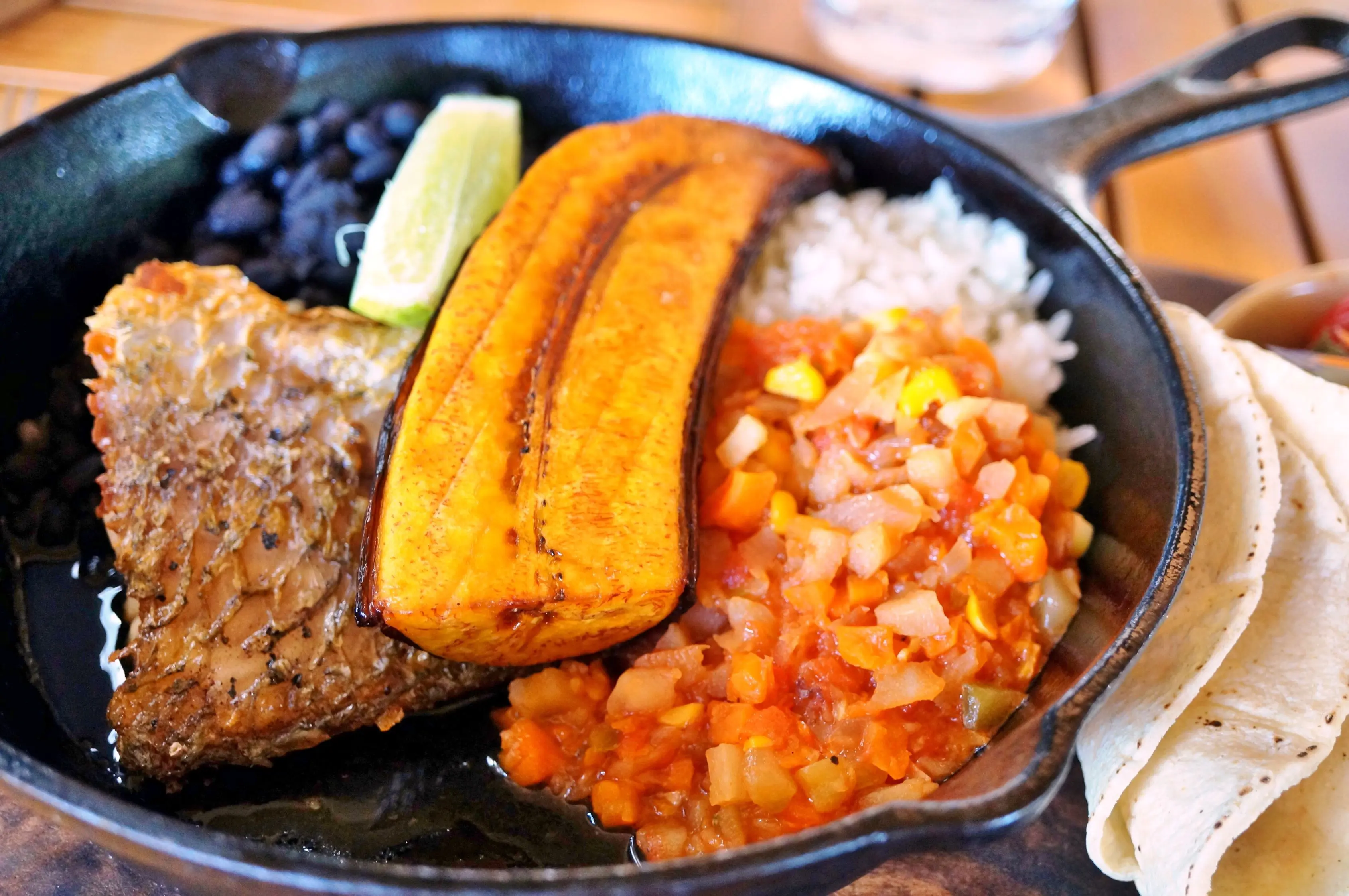 Traditional Costa Rican casado meal with rice, beans and plantains