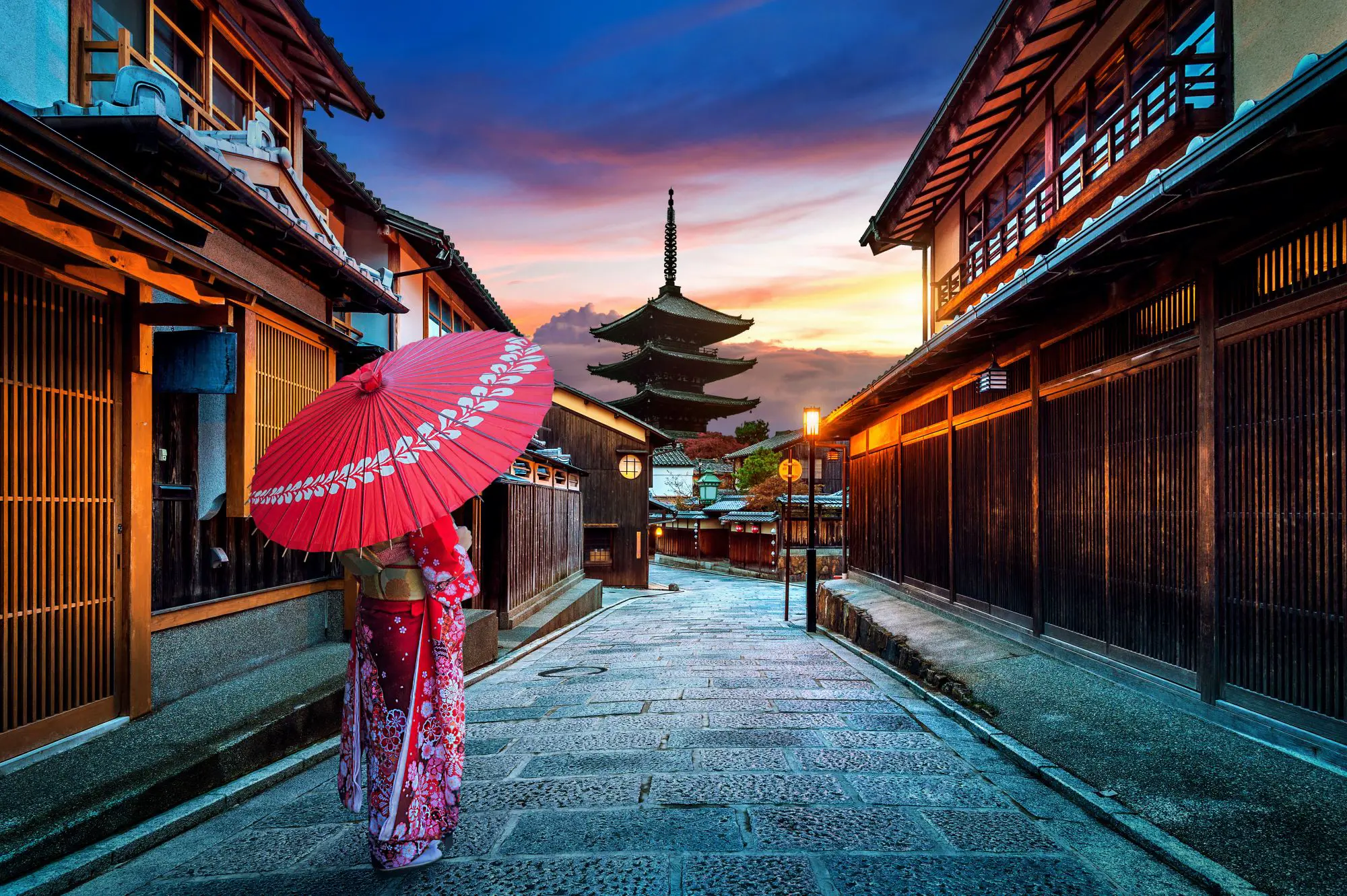 Woman Walking in Higashiyama district in the Old Town of Kyoto, Japan.