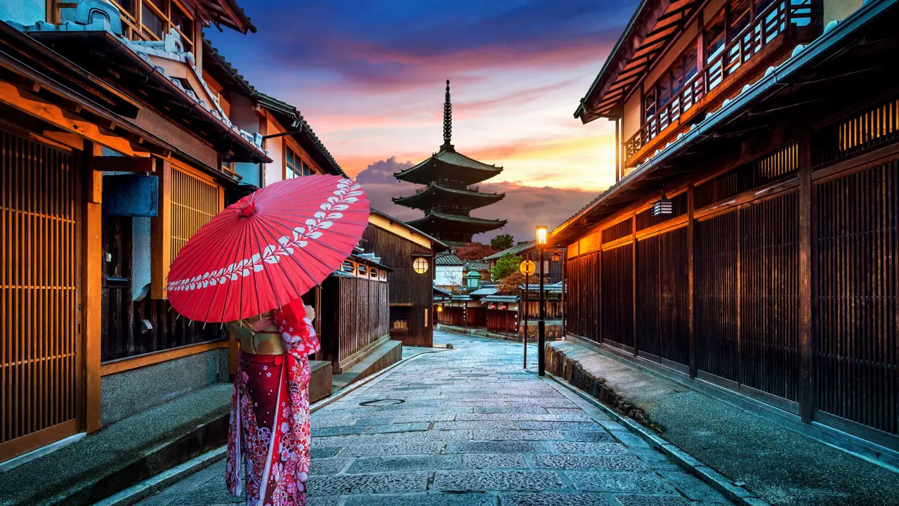 Woman Walking in Higashiyama district in the Old Town of Kyoto, Japan.
