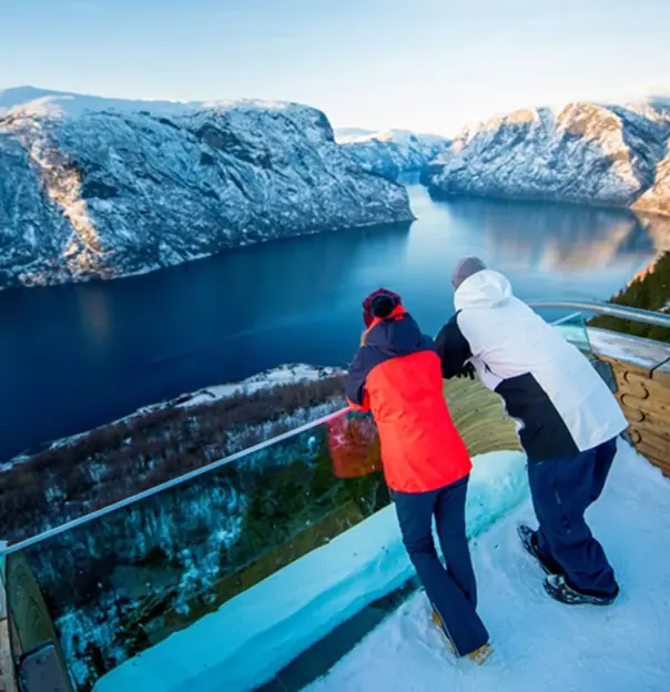Two people looking out from Stegastein Viewing Platform