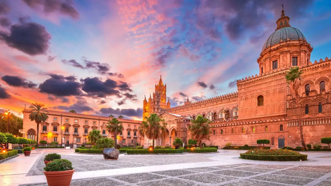 Palermo Cathedral at sunset, with warm light highlighting its historic architecture