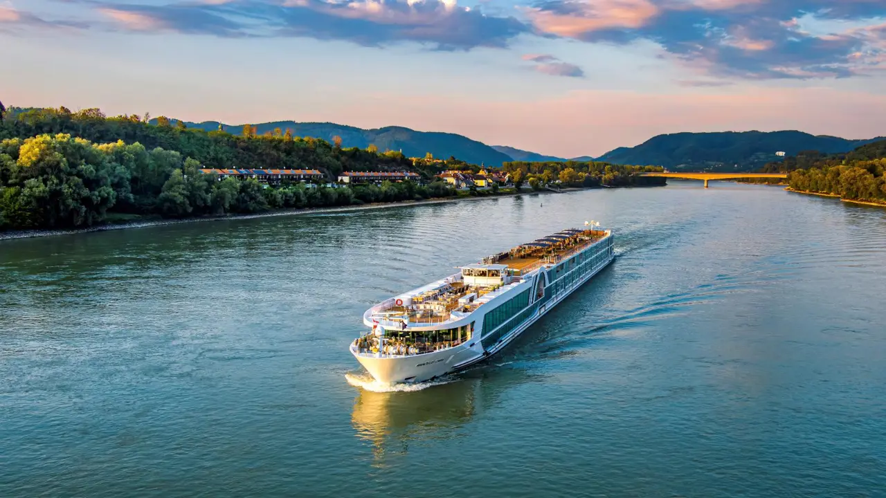 AMADEUS Cara Exterior View Day Wider Perspective Of The AMADEUS Cara On The River Pink Clouds Lueftner Cruises Amadeus Martin Skopal