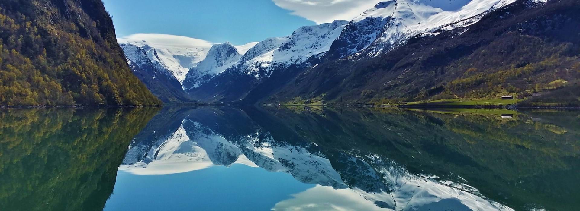 Fjord in Norway with snow in the mountain 