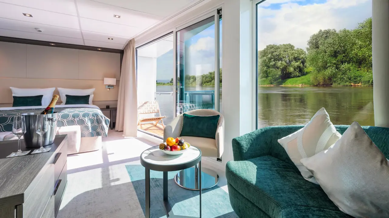 AMADEUS Cara Suite Details Suite Bottle Of Moet And Fruit On The Table View Of The Balcony Lueftner Cruises Amadeus Moving Pictures