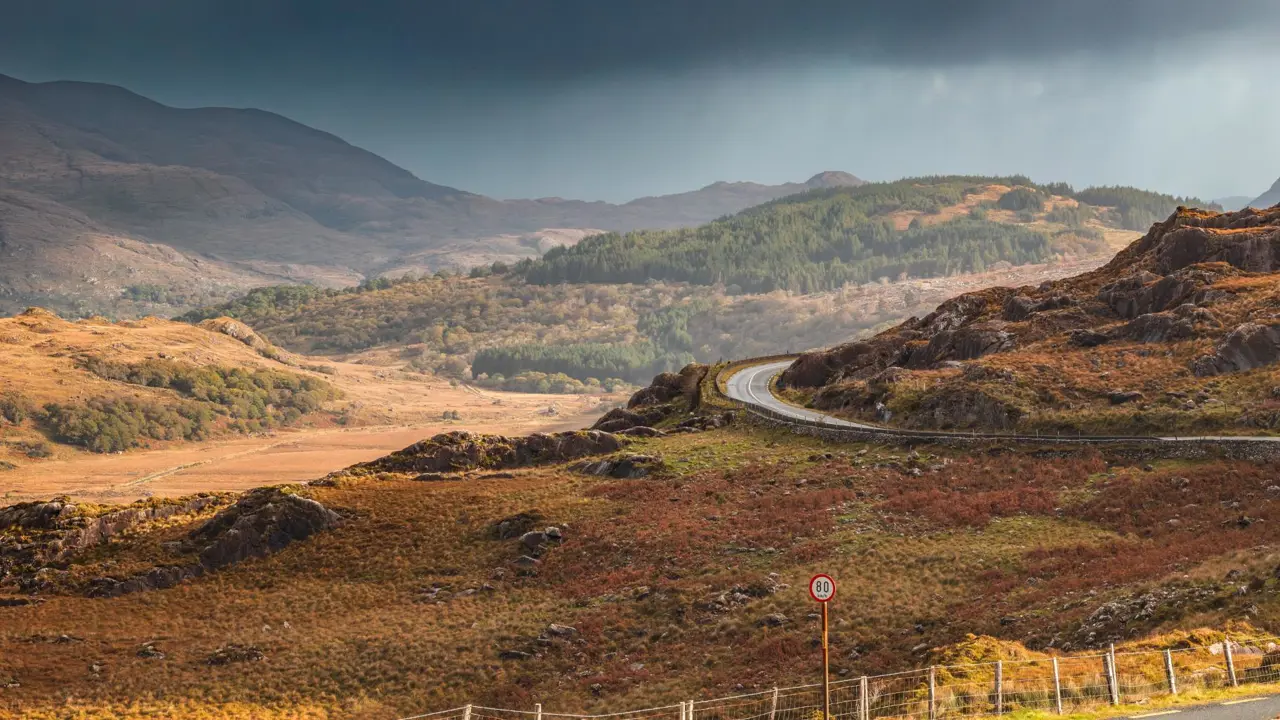 Macgillycuddy’s Reeks and Ring Of Kerry N71 road from Moll’s Gap, Killarney National Park, Ireland