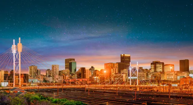 Nelson Mandela Bridge at night with Johannesburg city skyline in Gauteng