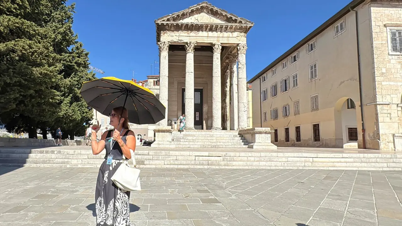 NMH tour guide and ancient Temple of Augustus, Pula