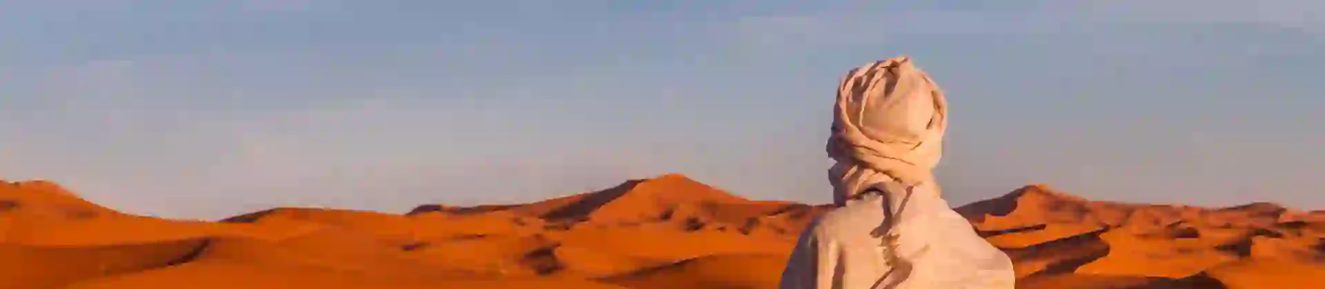 Berber stopping for prayer in the Sahara