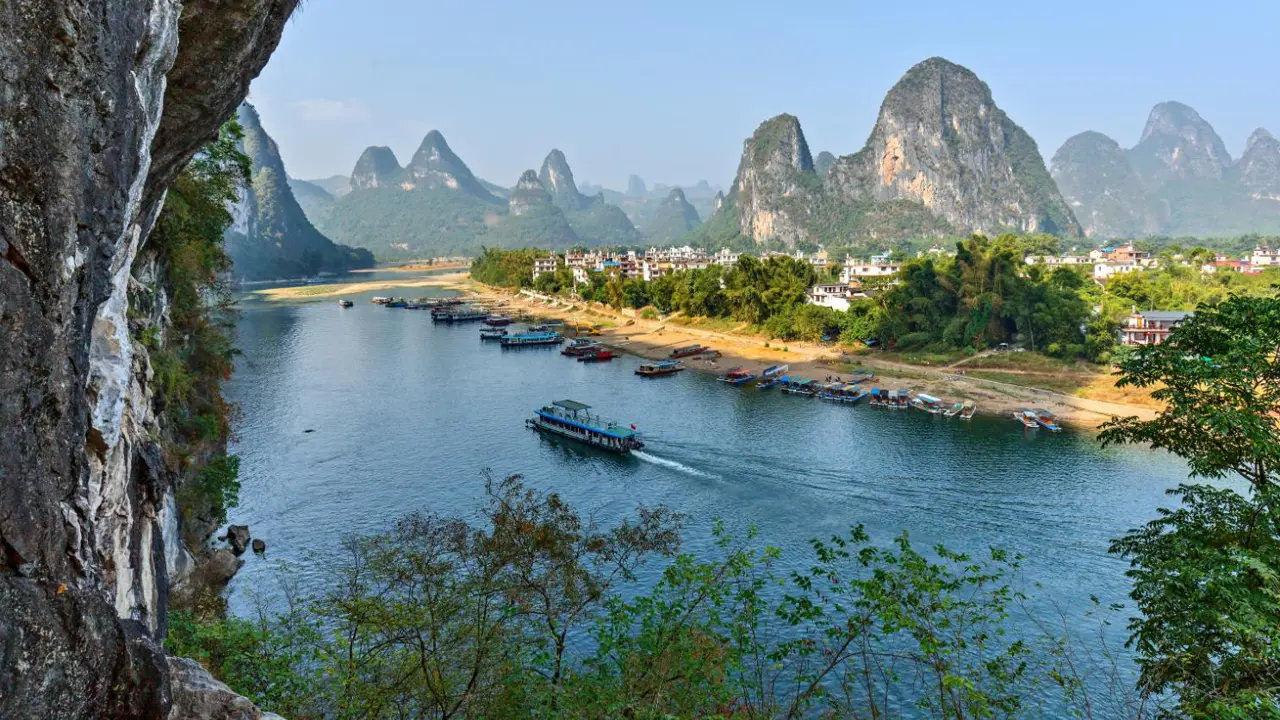 River Li and karst mountains view from the hill above town of Hingping, Yangshuo, Guangxi Province, China