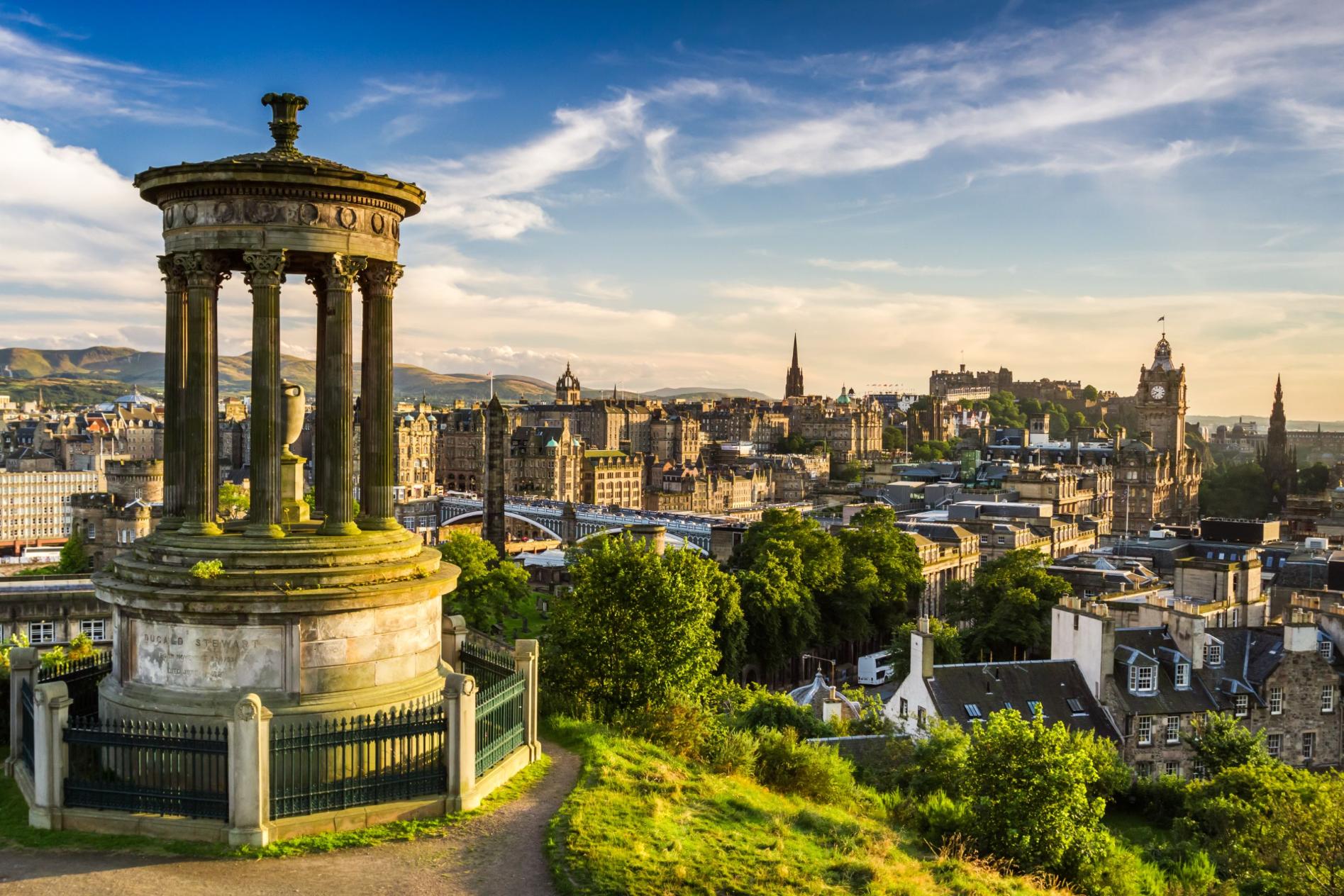 Edinburgh skyline at sunset from Calton Hill, with the Dugald Stewart Monument in the foreground