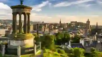 Edinburgh skyline at sunset from Calton Hill, with the Dugald Stewart Monument in the foreground
