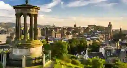 Edinburgh skyline at sunset from Calton Hill, with the Dugald Stewart Monument in the foreground