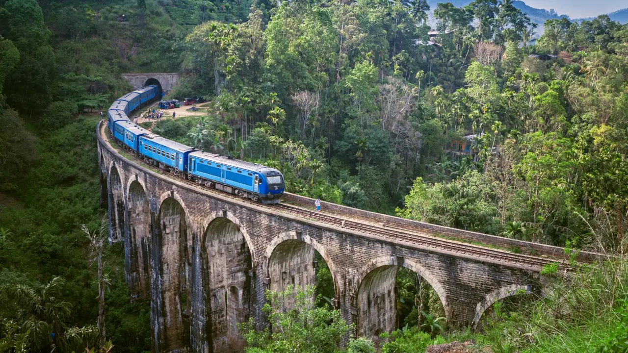 Train on Nine Arch Bridge in hill country, Sri Lanka